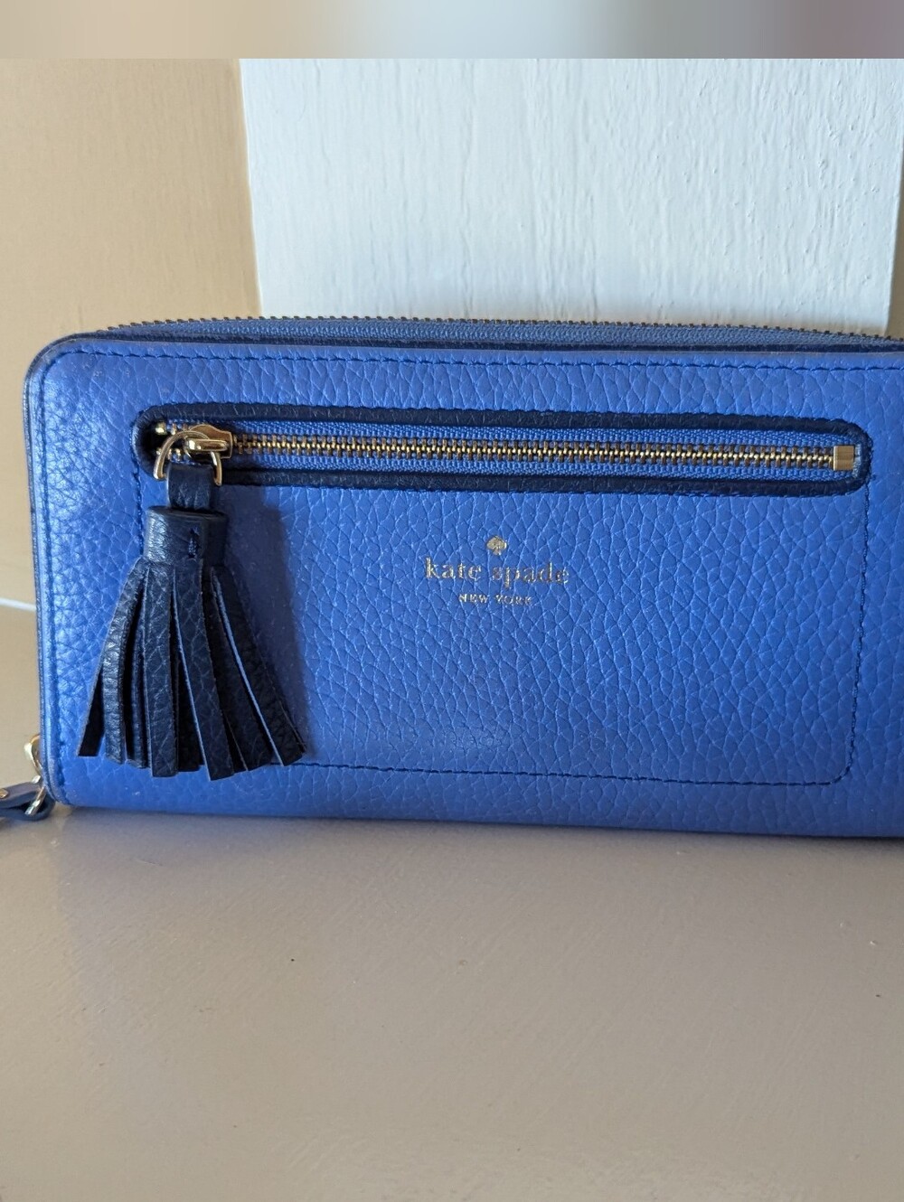 kate spade Blue Pebbled Leather Zip-Around Wallet with Tassel